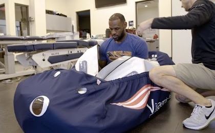 LeBron James enterning a mild hyperbaric chamber.